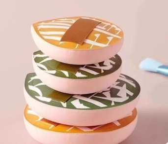 Puffs and pads for applying powder, cosmetics